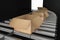 3d rendering : illustration of Perspective view of Cardboard boxes on Conveyor Belt of steel.box open. Part of warehouse