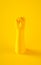 3d rendering illustration of yellow hand fist. Human body parts. Power concept scene for graphic design projects.