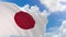 3D rendering of Japan flag waving on blue sky background with Alpha channel