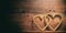 3d rendering joined hearts on wooden background