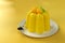 3d rendering - Lemon Pudding on plate with spoon, high quality details