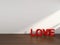 3D Rendering Love Text in a room with white wall,Valentine`s day