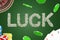 3d rendering of `LUCK` sign made of dollars with stacks of chips, pack of cards, roulette on green background