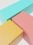 3D Rendering Minimal Geometric Product Display Background with Three Platform Blocks. Yellow, Pink and Turquoise