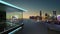 3D rendering of a modern glass balcony with city skyline real photography background