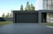 3d rendering of modern house with garage on tree background