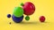 3D rendering of multi-colored balls, spheres of different sizes randomly located in space on a yellow background. Vitamins, an