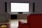 3D Rendering night theater room comfort sofa blank LCD TV screen for Home entertainment background