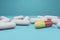 3D rendering One red and yellow capsules pill with white capsules pills