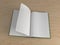 3d Rendering of an open hardcover book with white empty pages