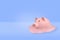 3d rendering of a piggy bank which is half-melted down on a blue background.