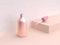 3d rendering pink geometric scene metallic pink liquid bottle opening glass tube drop