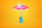 3d rendering of pink UFO with blue boxing glove hanging below it on amber background.