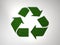 3d rendering of the recycling symbol made with 3d grass on white background