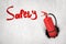 3d rendering of red fire extinguisher breaking white wall with red `Safety` sign on white background