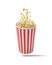 3d rendering of a round striped popcorn bucket hanging in the air with popcorn flying out of it.