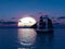 3D rendering of a ship out at sea at sunset