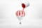 3d rendering of small silver paint bucket turned upside down with red paint pouring on hot air balloon isolated on white