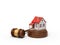 3d rendering of small white house with red roof on round wooden block and brown wooden gavel