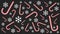 3D-rendering of snowflakes and candy canes isolated on black background