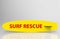 3d rendering. Surf Rescue word on yellow surfboard with clipping path on gray background