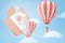 3d rendering of three striped hot-air balloons and several white clouds flying out of a big cardboard box in the blue