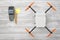 3d rendering top view of white drone with sticky notes, pencils and pin pad on white wooden desk background