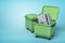 3d rendering of two green trash cans, front can open with bent and broken metal safe inside, on light-blue background.