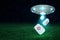 3d rendering of UFO in air at night with three doctor`s medical cases falling down from its open hatch onto green lawn.