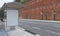 3D rendering of an urban street with a bus stop shelter and a blank billboard