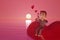 3d rendering ,Valentine background with hearts falling and alone man sitting on heart sending love message