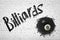3d rendering of white brick wall with title `Billiards`, and black billiards ball with number 8 smashed into wall.