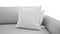 3D rendering of white pillows on a grey comfortable sofa isolated on a white background