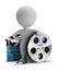 3d small people - cinema clapper and film tape