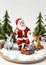 3D Toy Of Santa Claus Enjoying A Snow Picnic With Woodland Creatures On A White Background. Generative AI