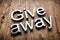 3d white lettering - Give Away - on rustic wood