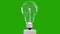 3D wind turbine turning inside of a lightbulb, green energy, seamless loop, Green Screen Chromakey