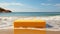 3D yellow podium with copy space for product display presentation on beach with blue sky and white clouds background. Tropical