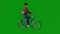 3D of young white girl riding bicycle on green screen going home with friends and exercising side view in Chroma 4K