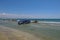 4 x 4 jeep in the sea water with trailer, loading a jet ski on L