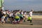 4-6-2019 Tulsa USA Colorfully dressed first runners storm out of the gate in the Color Run race across the 21st Street Bridge