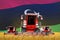 4 bright red combine harvesters on grain field with flag background, Libya agriculture concept - industrial 3D illustration