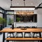4 A contemporary, urban-inspired dining room with a long wooden table, black metal chairs, and industrial lighting5, Generative