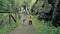 4 k slow-motion beautiful young family, mother and son walking along the picturesque scenic contryside peatonal road at