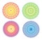 4 Mandalas in 4 colors. Openwork colorful circular ornament with Aum / Ohm / Om symbol.