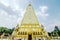 4-sided shape pagoda : architecture landscape of white and gold pagoda at wat Phrathat Nong Bua in Ubon Ratchathani province,