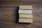 4 Wood Blocks Front View, On Wooden Table, polished wooden table background