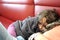 4 year old girl resting in the living room of a ferry