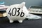 403b plan written on a piggy bank