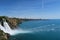 The 40m High Duden Waterfall and Small Boat in the Ocean